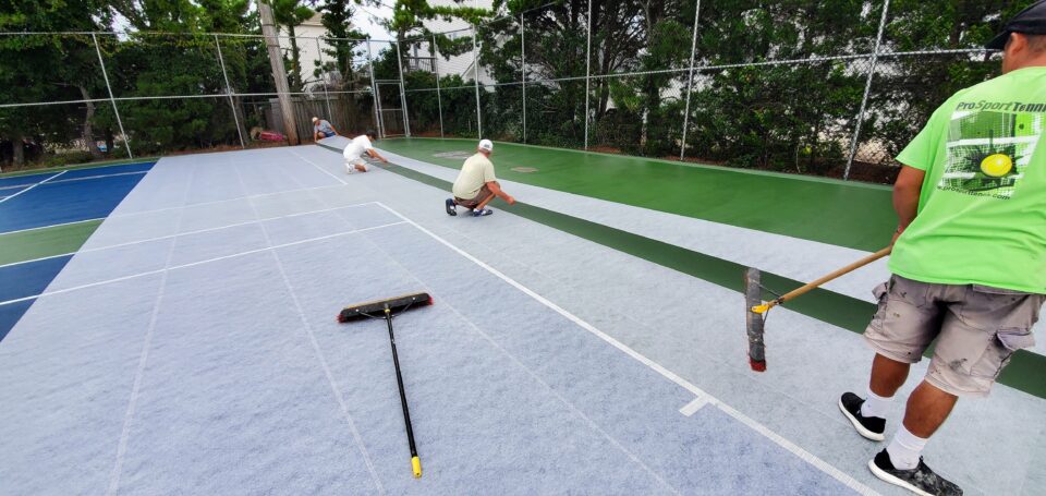 Laying bamalex into reinforced polyester scrim Tennis Court Morgan Hill CA Bay Area